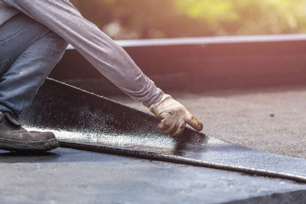 Professional Basement Waterproofing technician working in Clarkston, WA